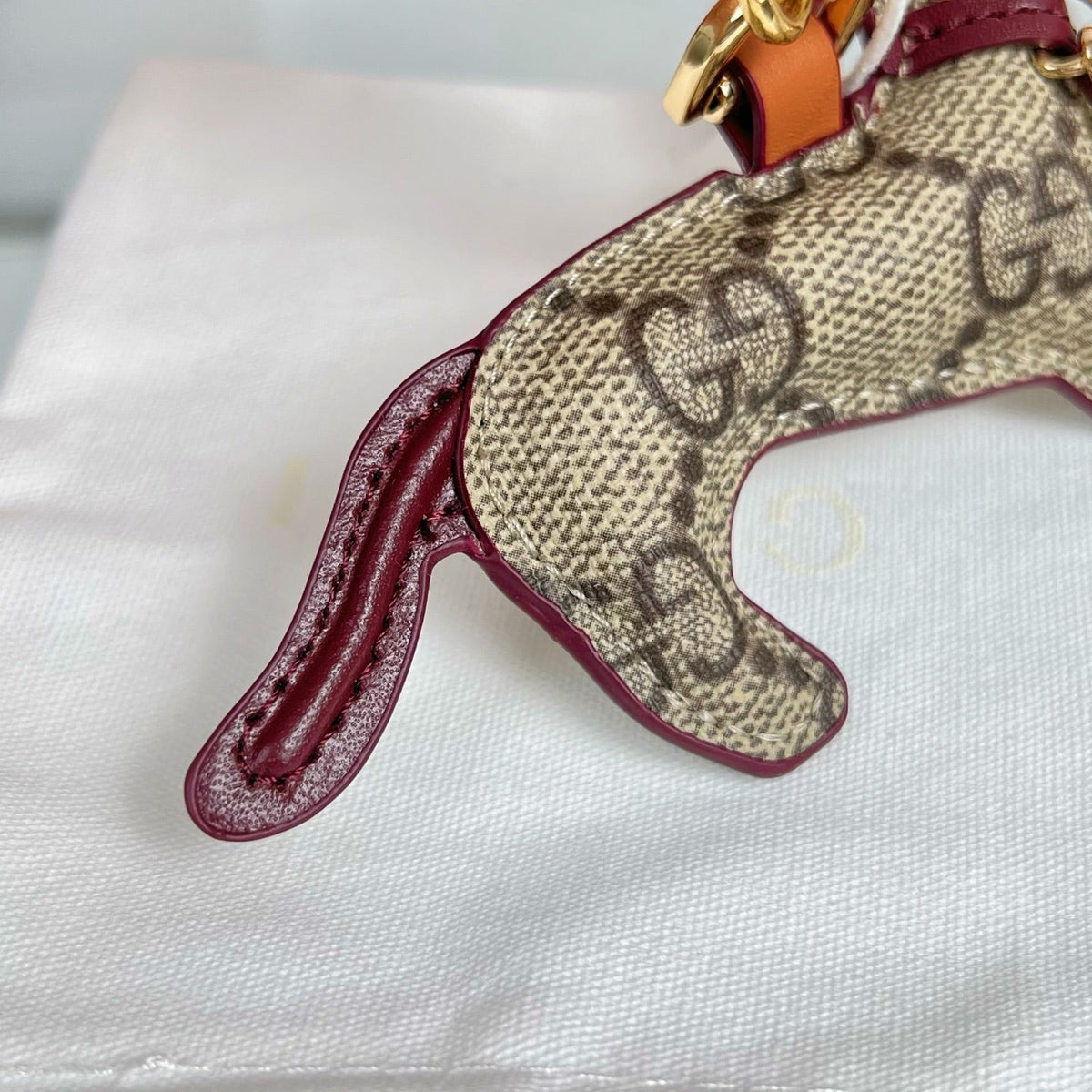 Gi Dog-shaped Etoupe Gold Bag Charm